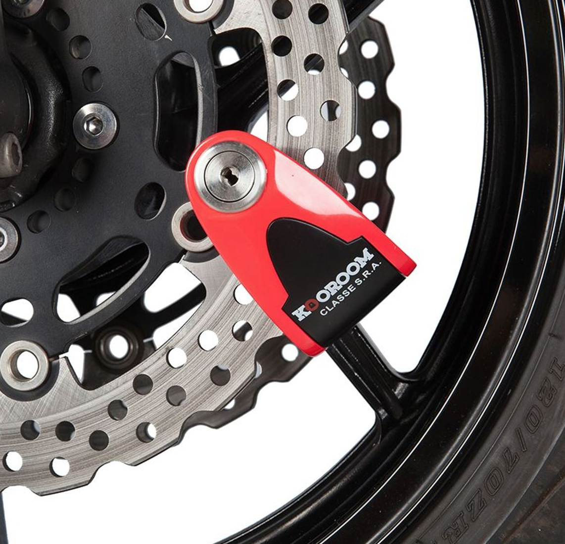 Bloque-disque antivol moto installé sur le disque de frein, assurant une protection dissuasive contre le vol.