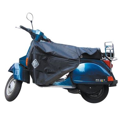 Tablier TERMOSCUD R013X pour scooter, conçu pour rouler au chaud et au sec pendant l’hiver, même par temps froid et pluvieux.