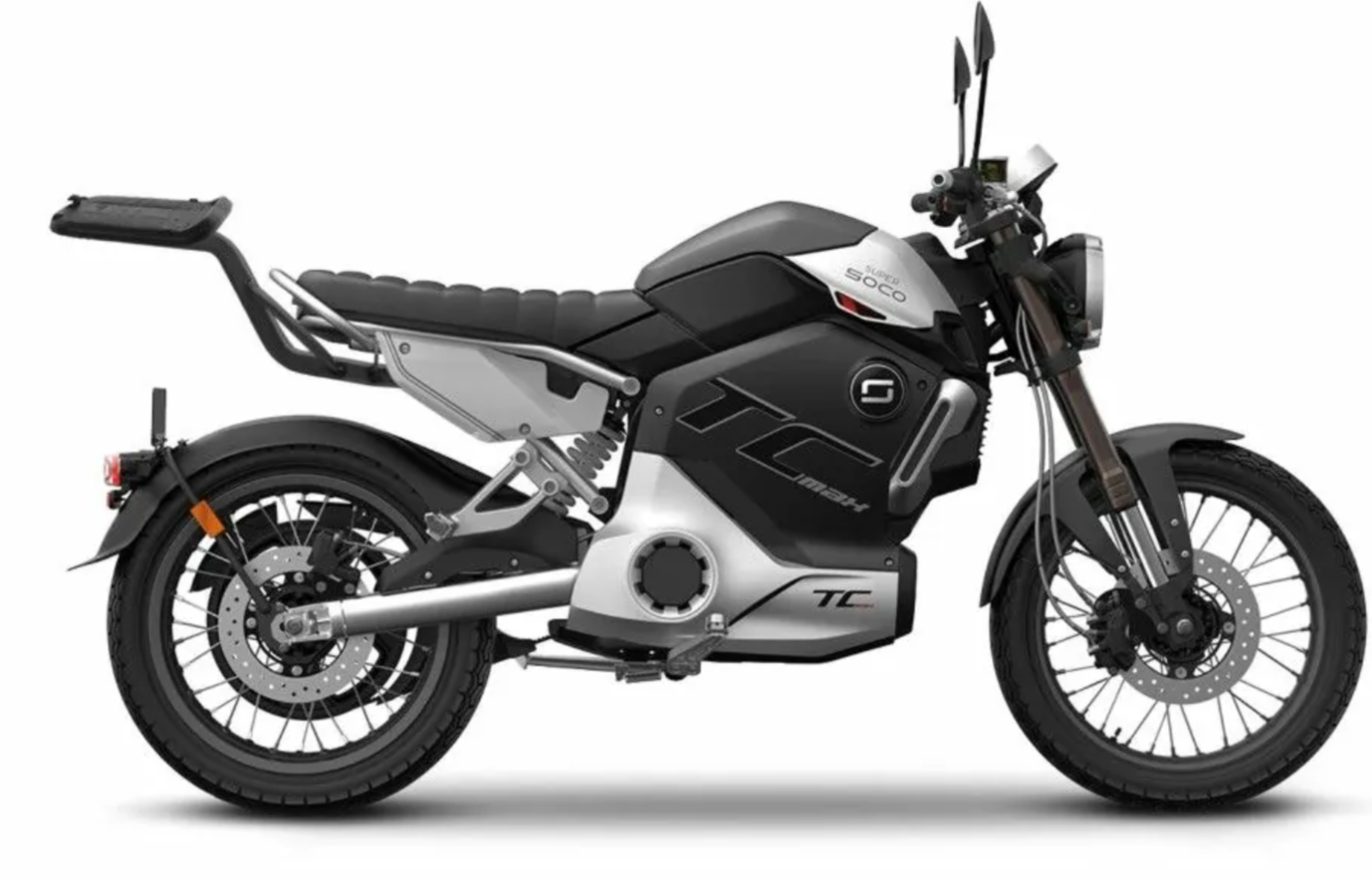 Support Top Master SHAD monté sur Super Soco TC Max, assurant une fixation stable et adaptée pour top case.